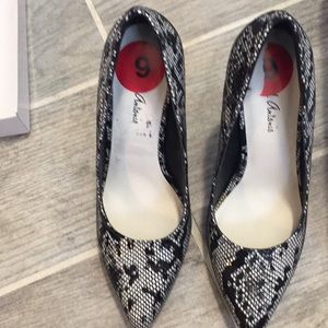 High heeled shoes never worn